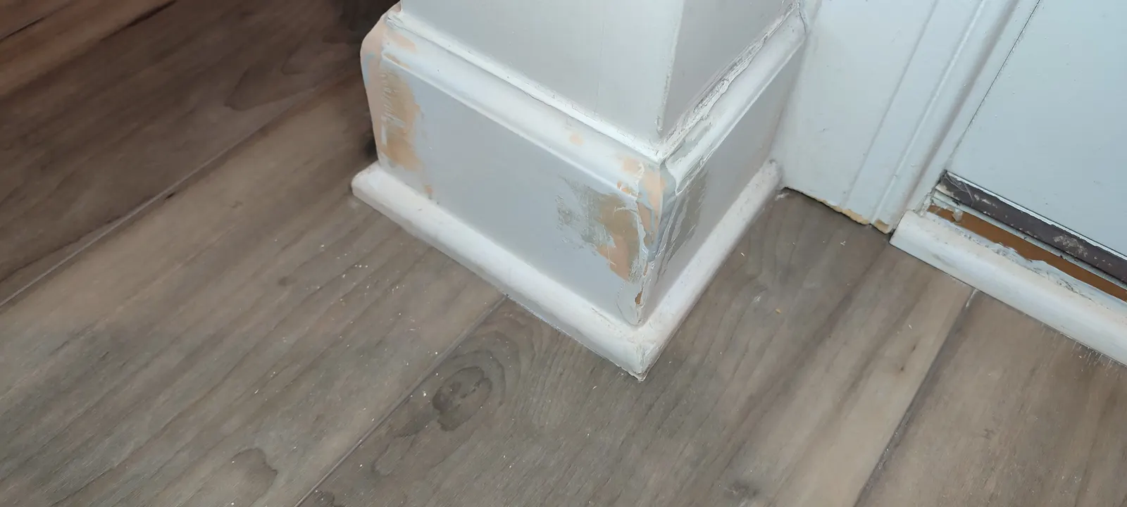 Doorway baseboard corner during repair