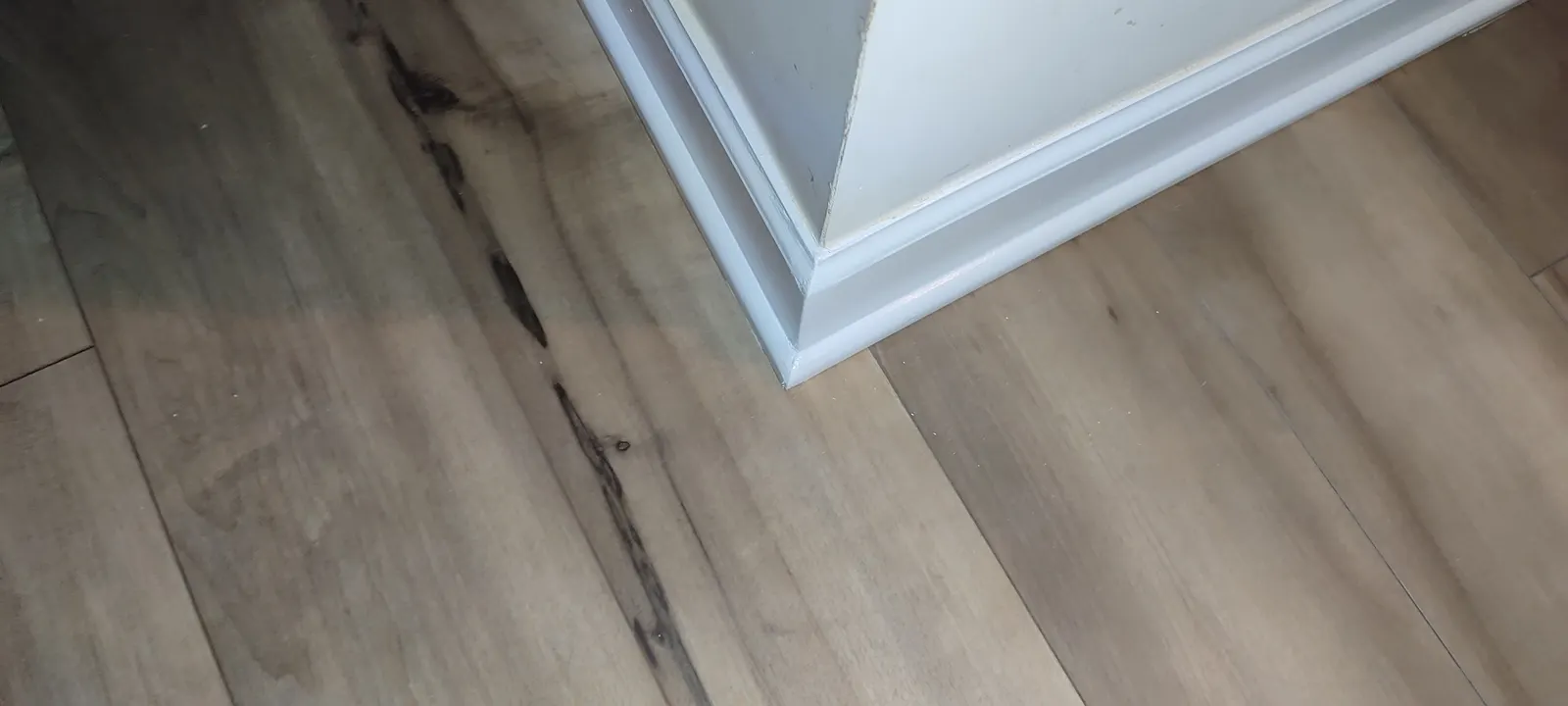 Repainted outside baseboard corner