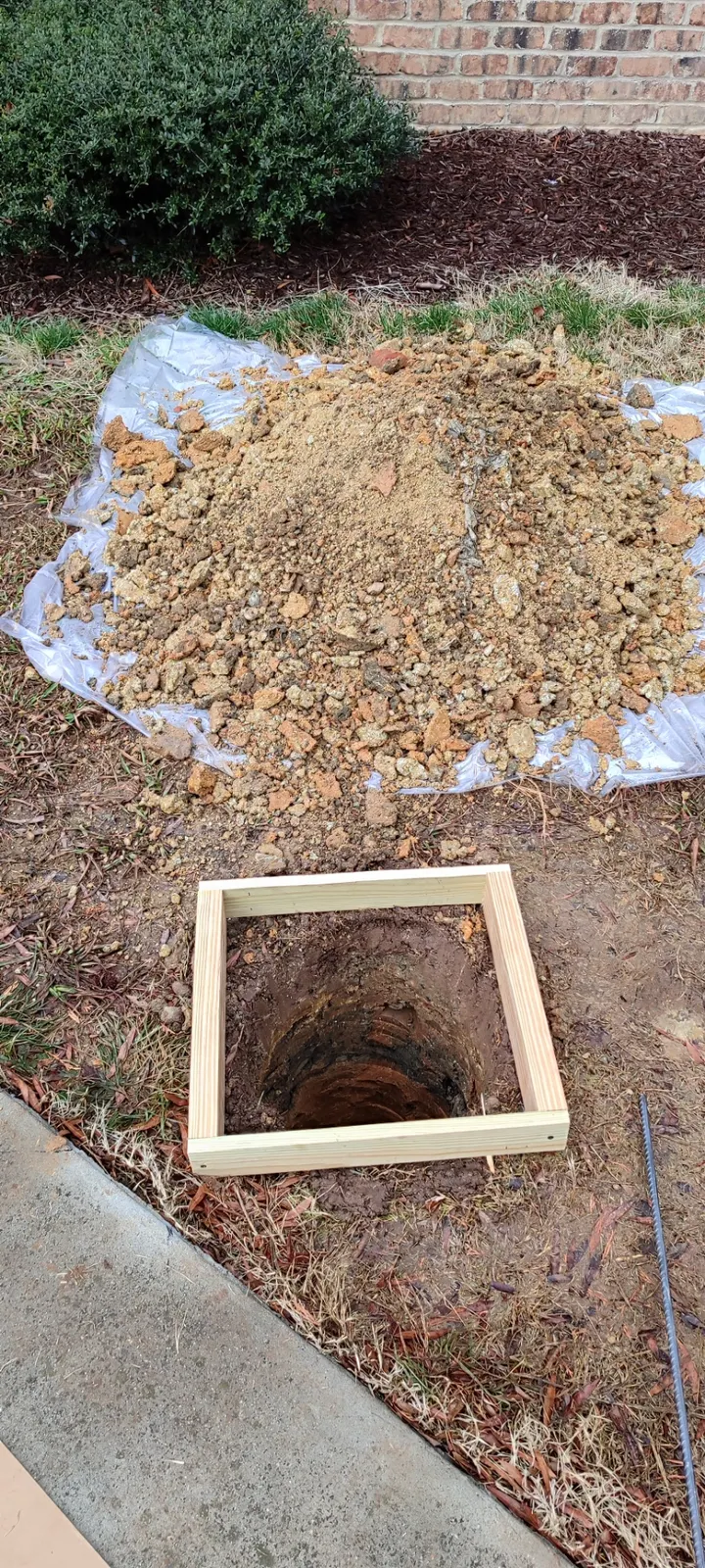 Footing excavation beside the driveway