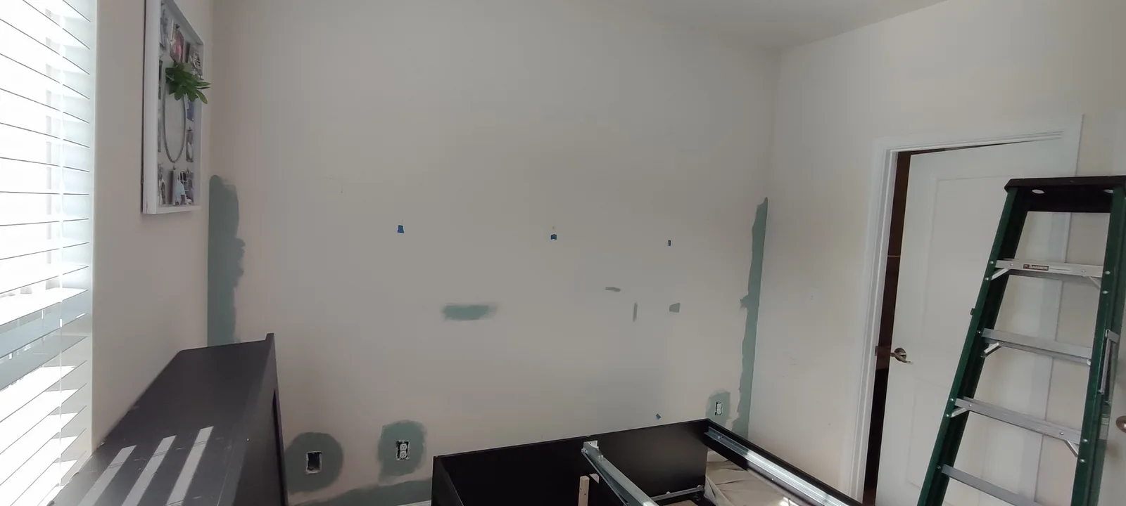Prepared bedroom wall before the finish coat of paint.
