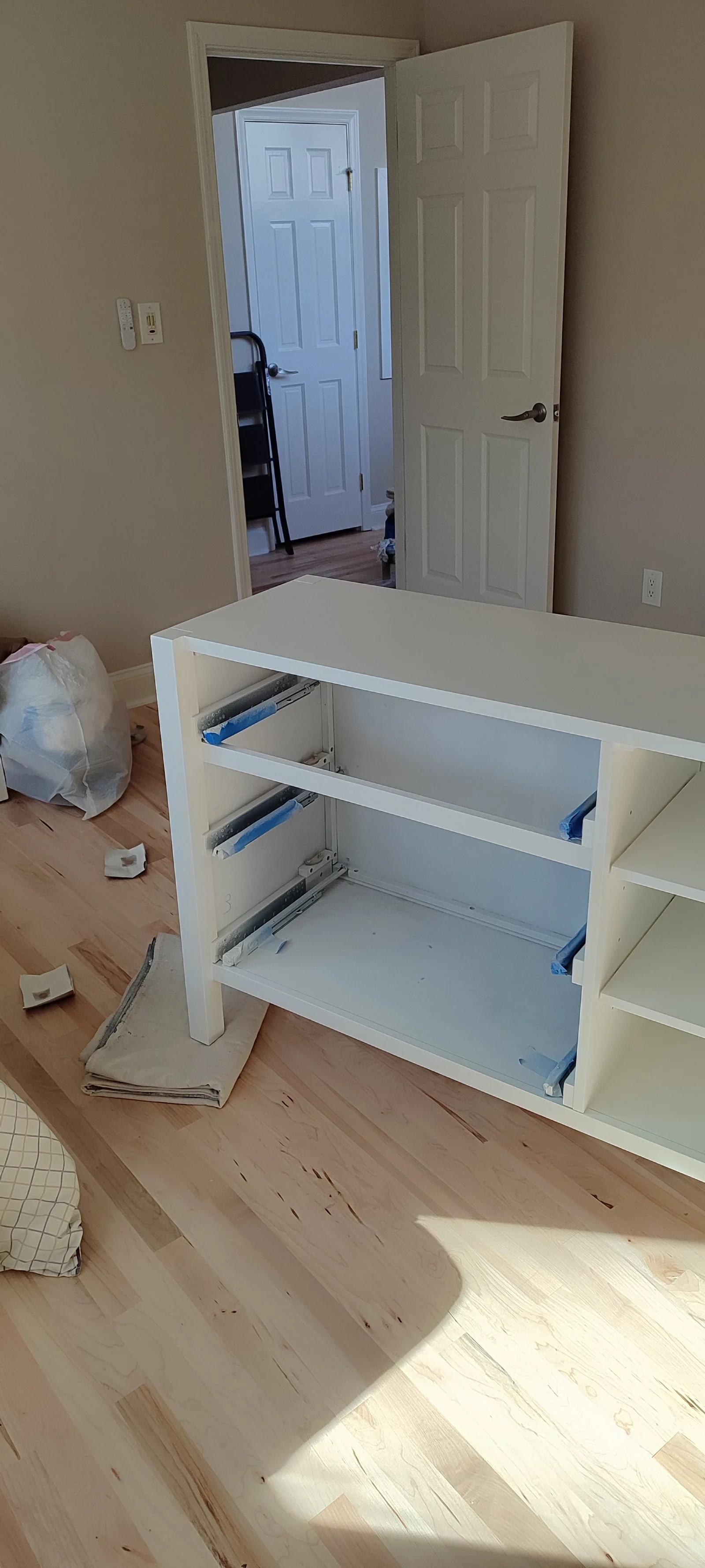 Painted wide dresser frame before drawers and door are refitted