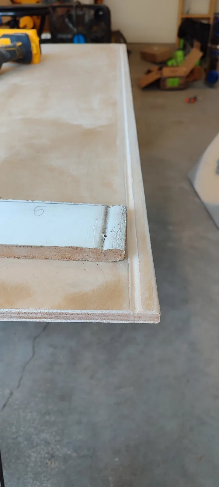 Original siding profile used as a reference for fabricating the custom replacement panel