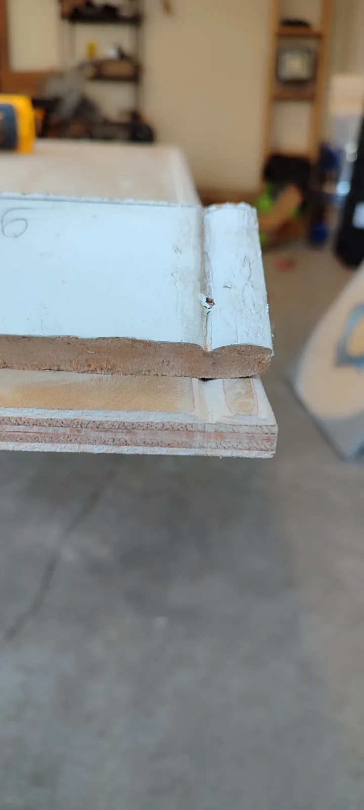 Detail of the original siding edge used to match the replacement panel profile