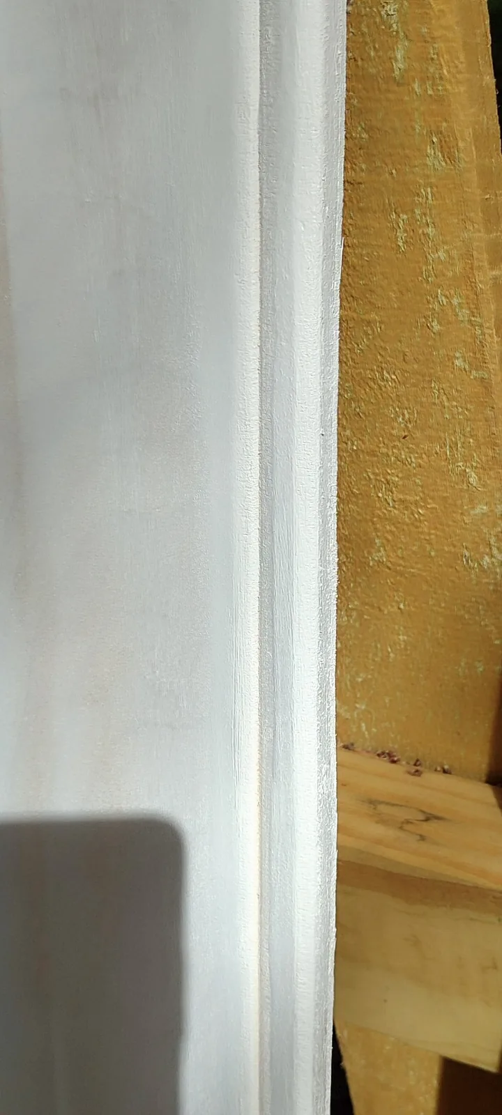 Detailed view of the custom-routed profile created to match the existing exterior siding