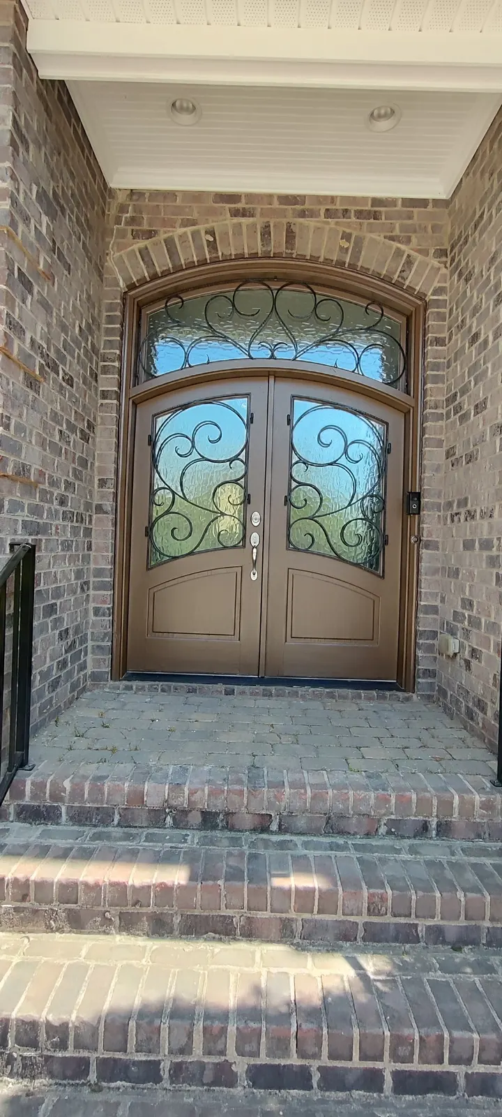 Refinished double doors and front steps