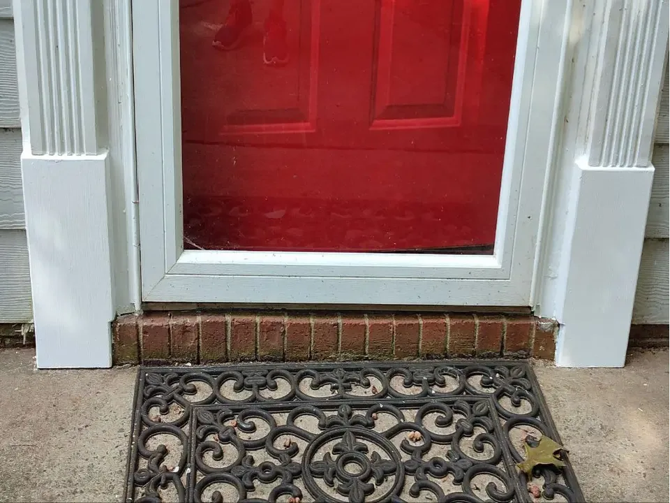 Front door after repair of the lower exterior trim.