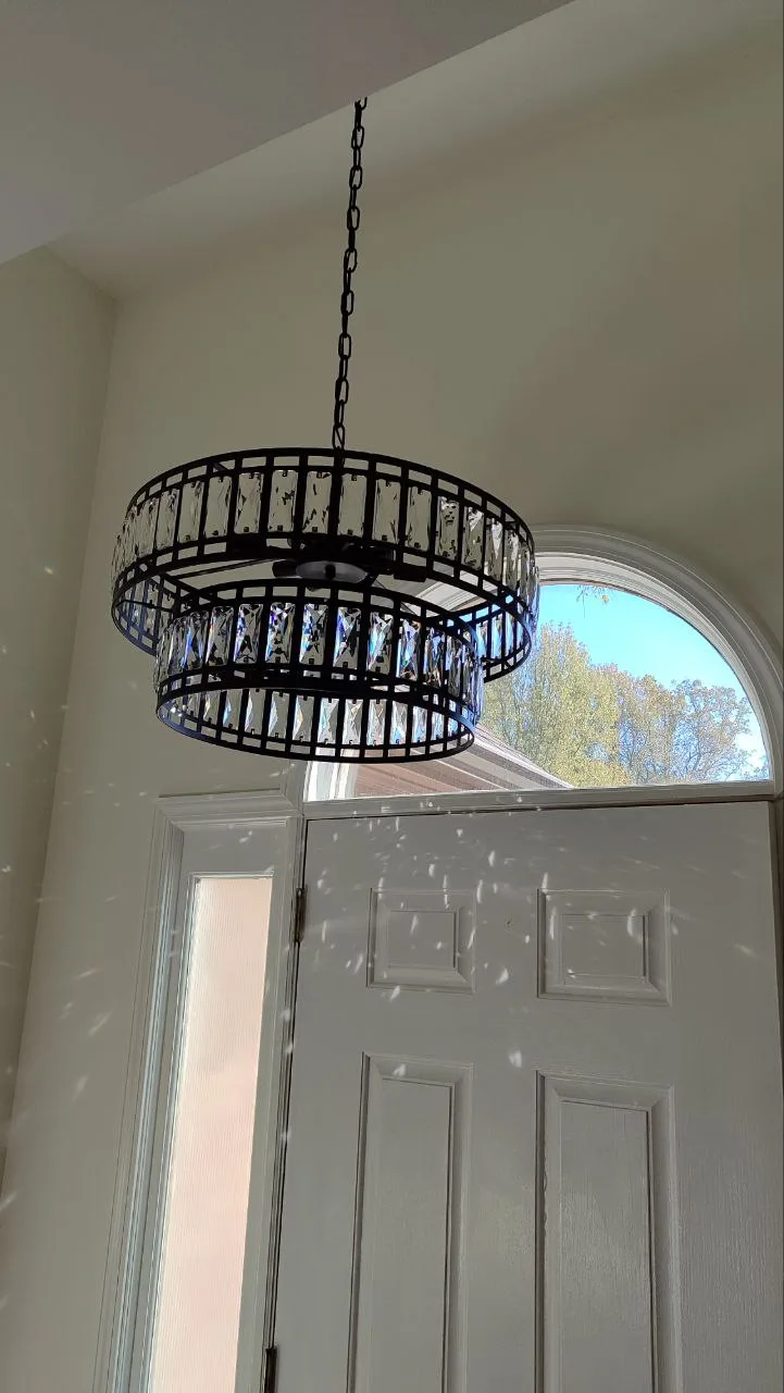 Round decorative pendant light after installation.