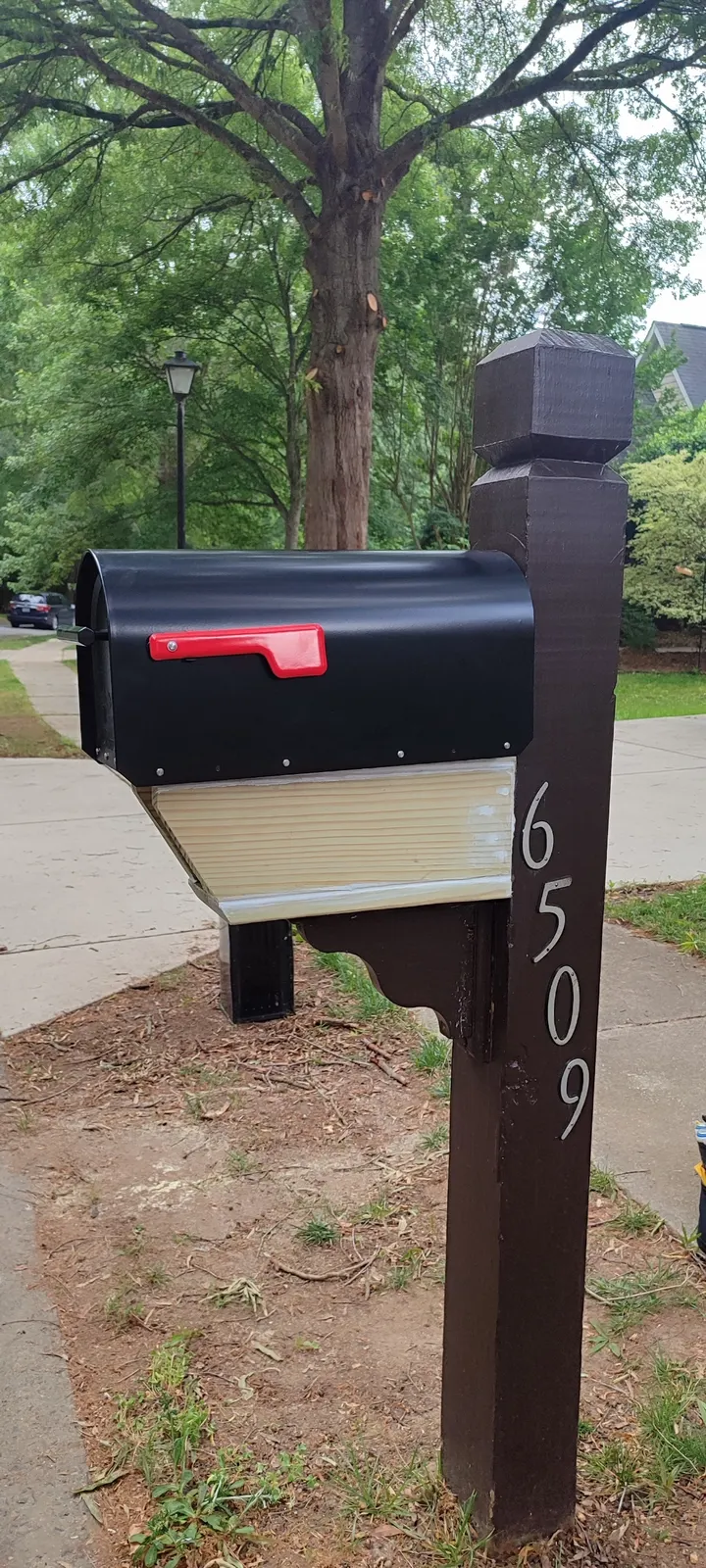 Opposite side of the mailbox wood repair