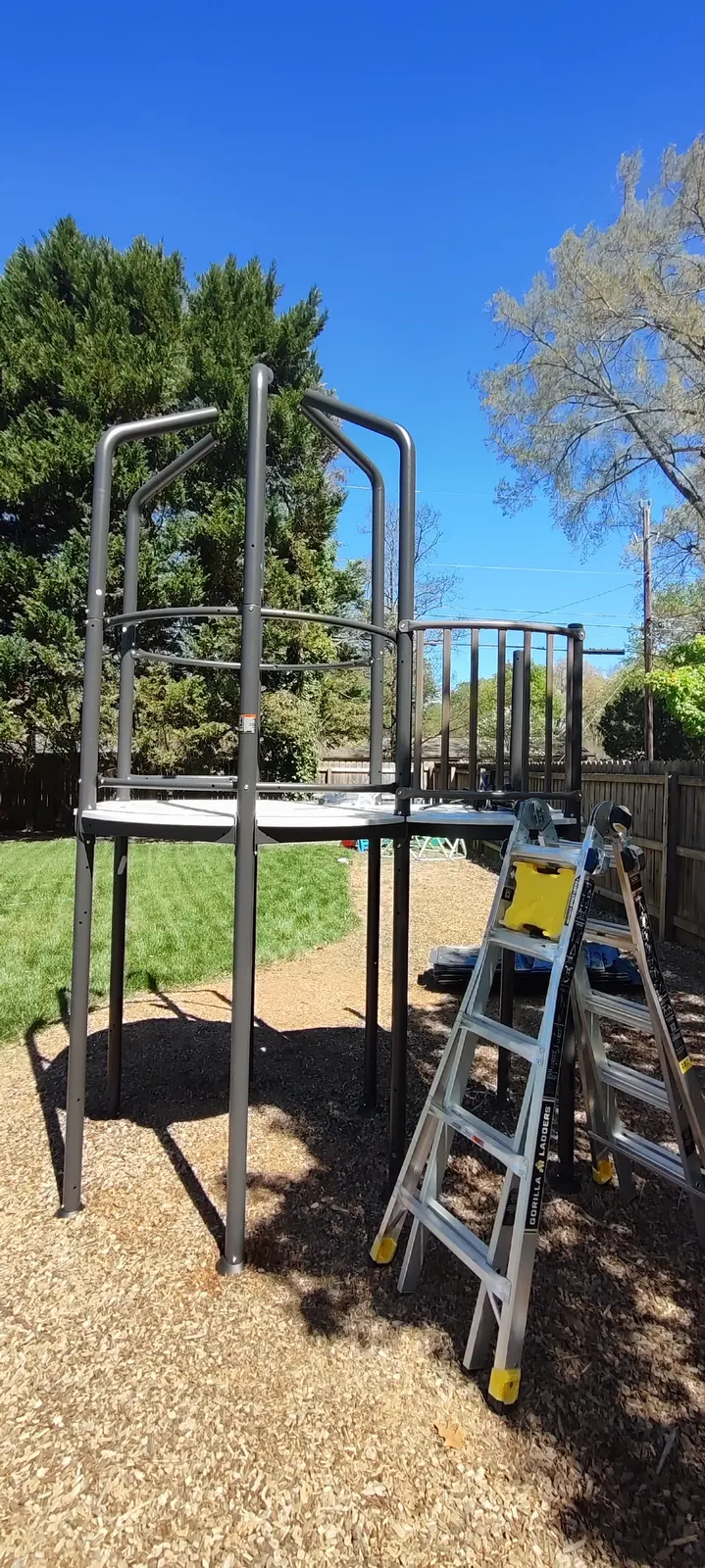 Metal playset tower frame during assembly