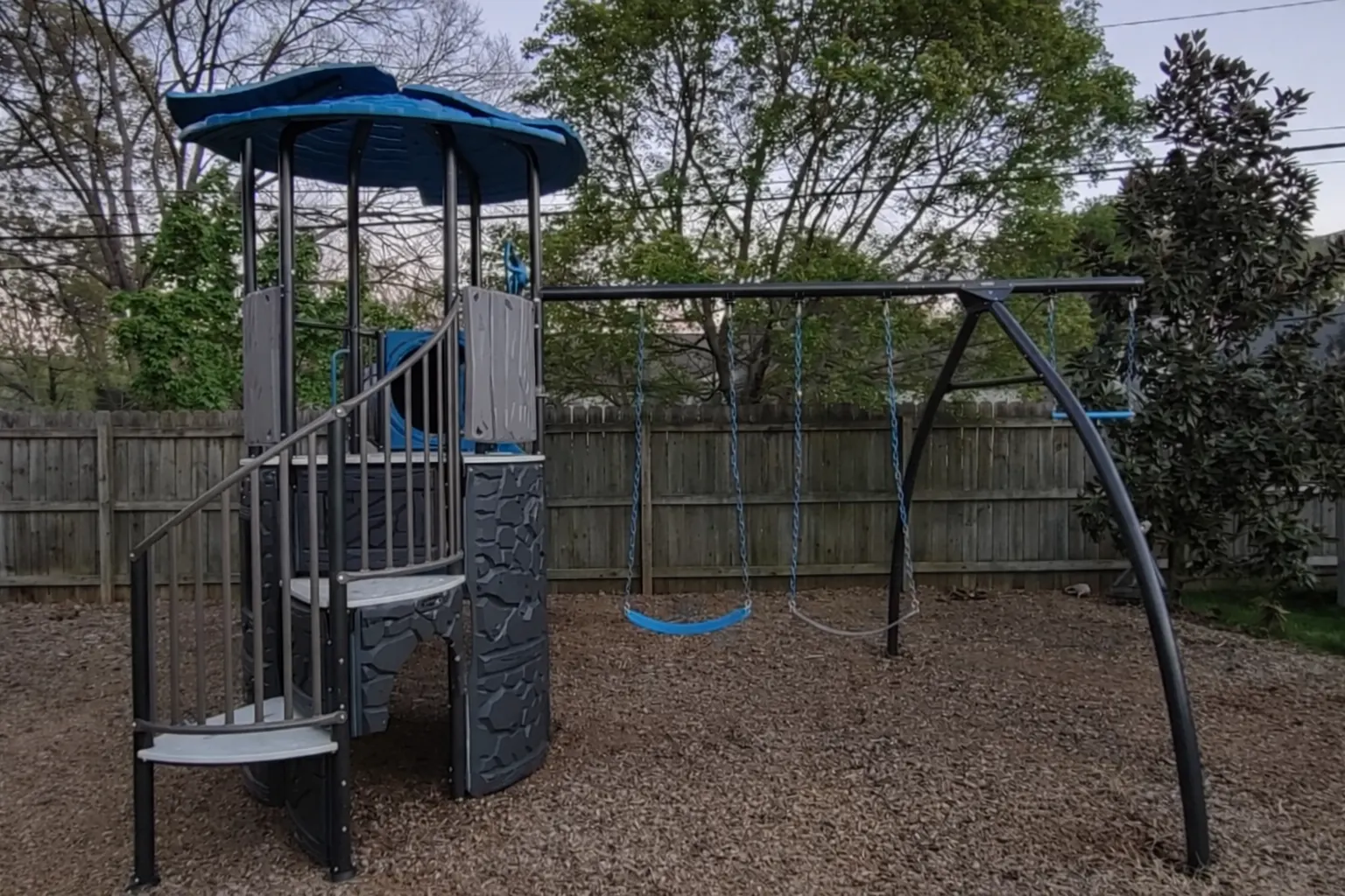 Assembled playset tower and swing section