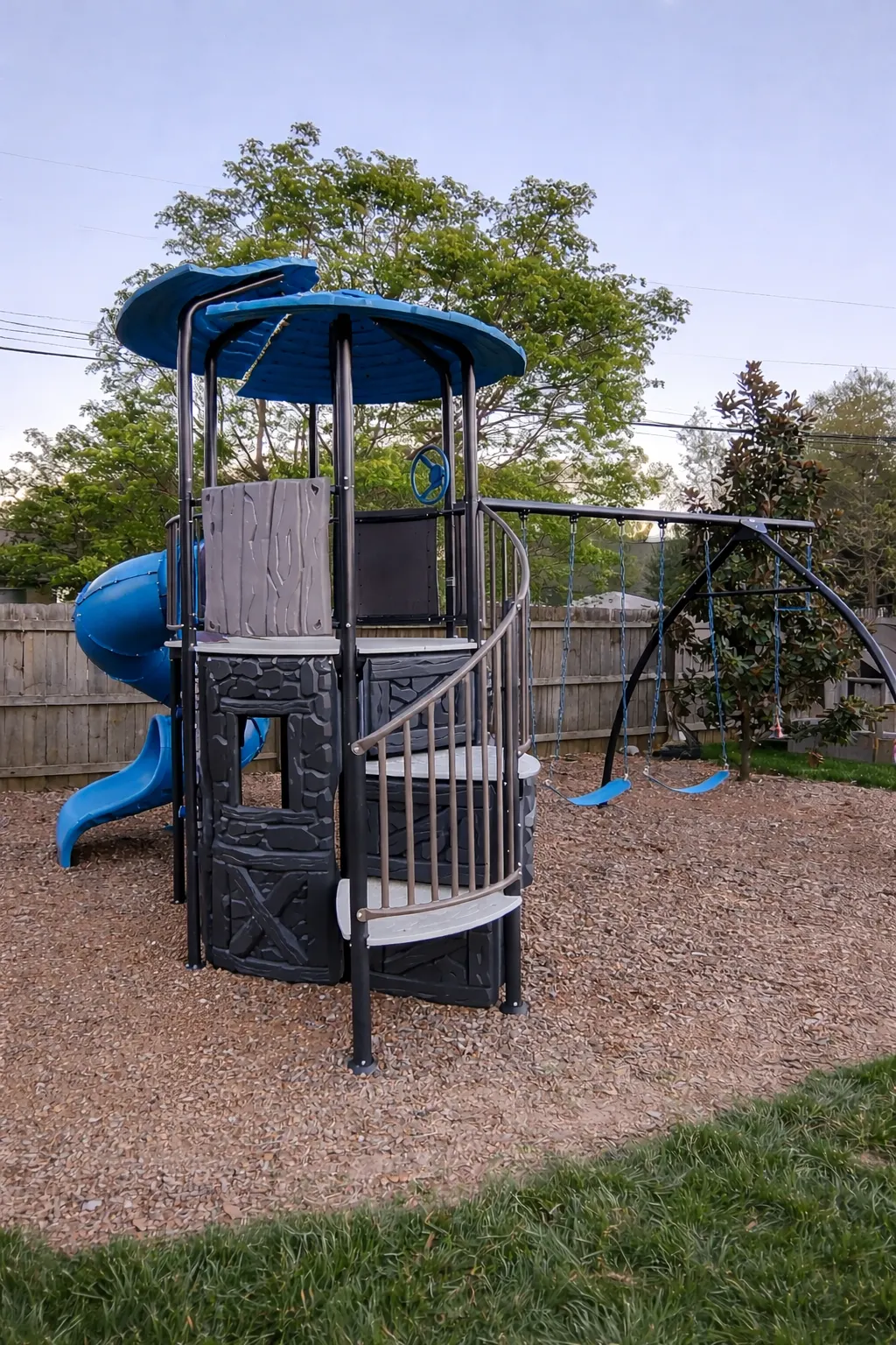 Front view of the playset tower and curved steps