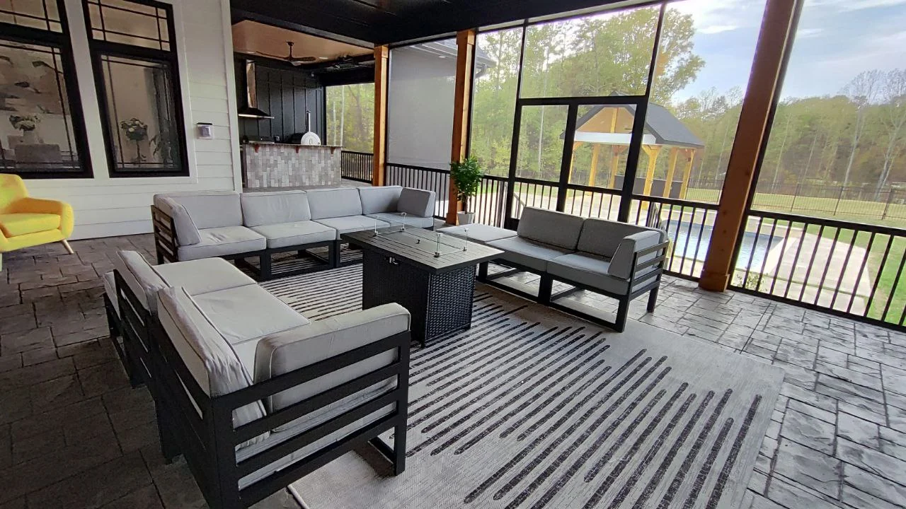 Reverse view of the seating group and screened porch