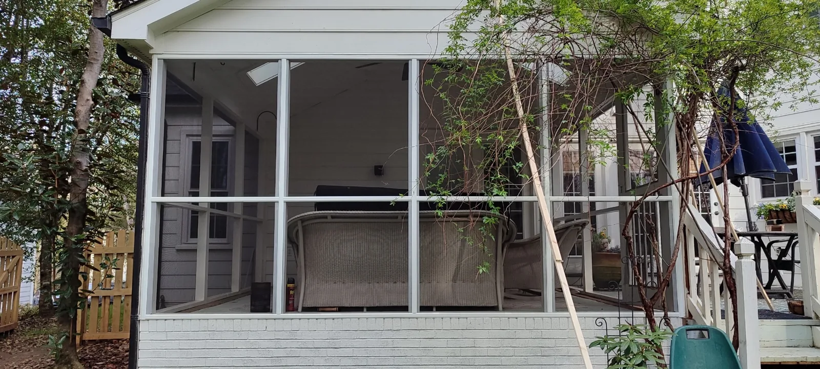 Large porch screen openings prepared for new screen mesh and retaining trim