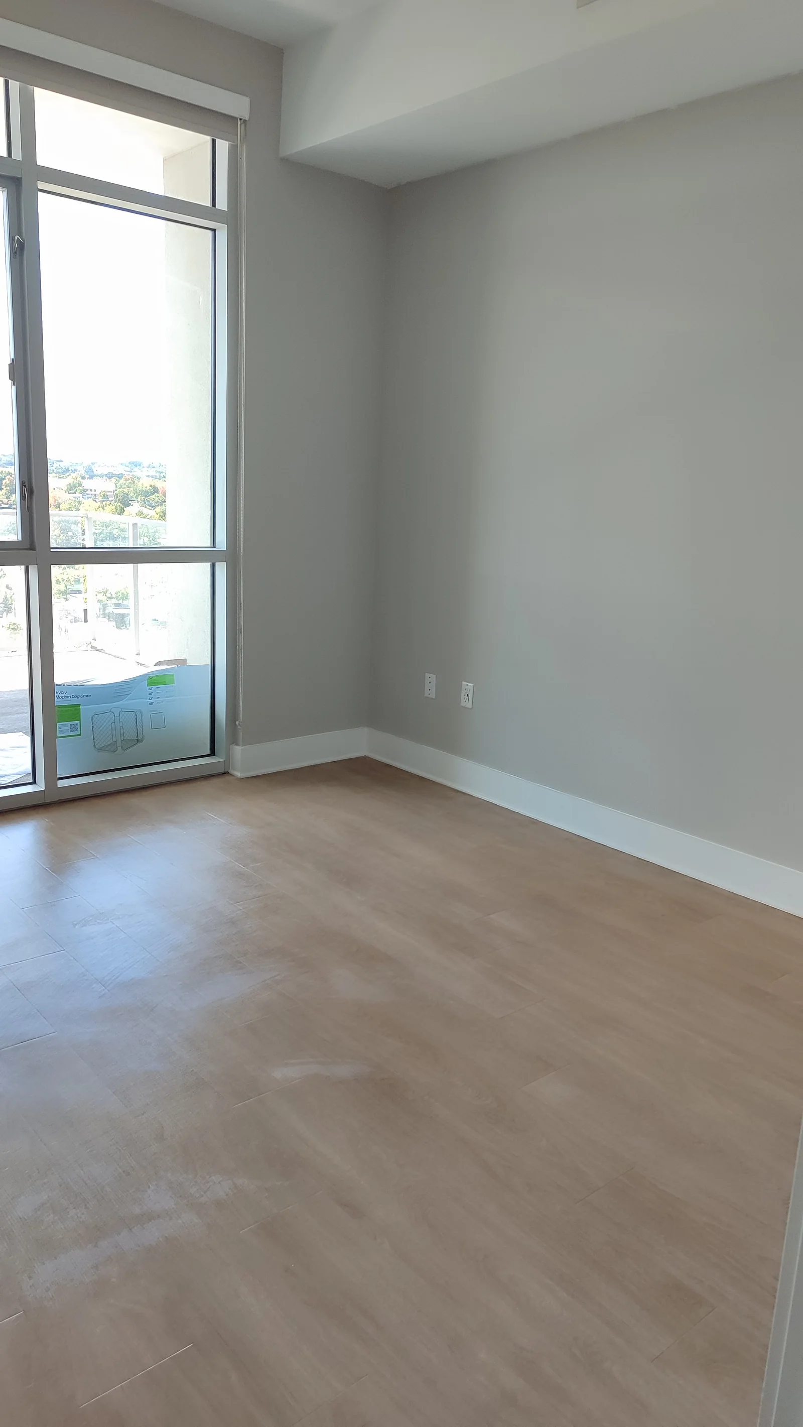 Repainted room corner with the window on the left