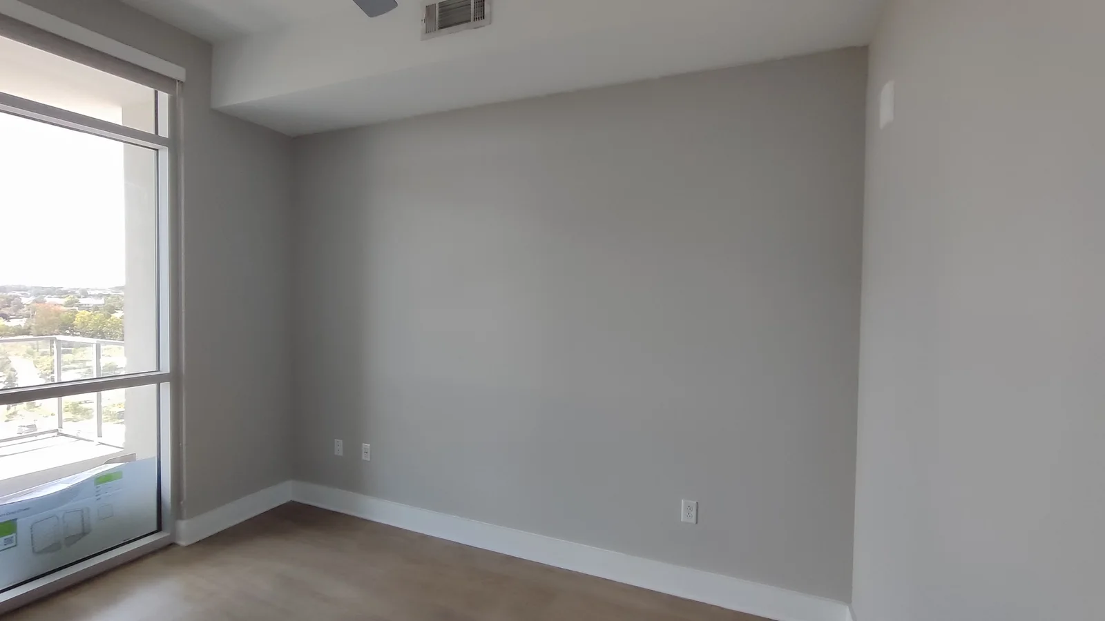 Repaired and repainted main wall beneath the ceiling vent
